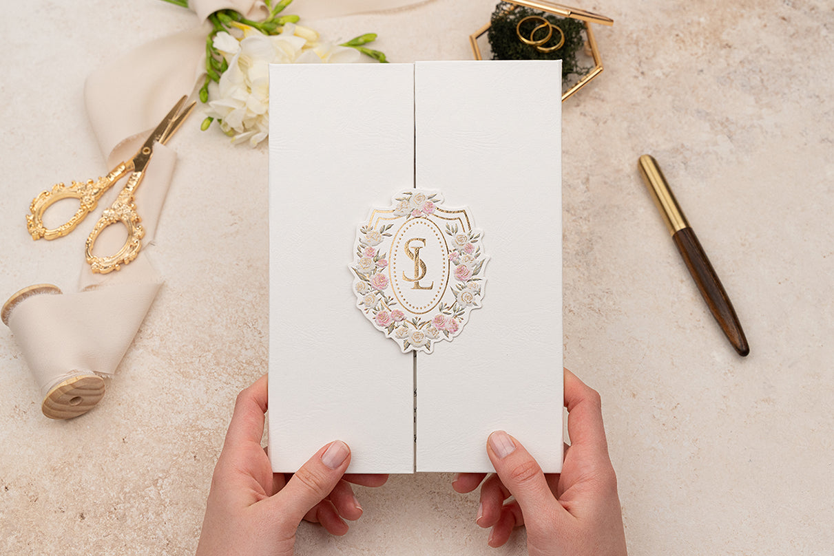 Elegant White Folded Invitation with Floral Monogram & Gold Foil
