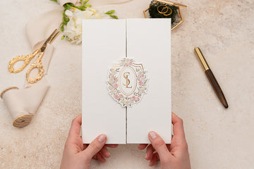 Elegant White Folded Invitation with Floral Monogram & Gold Foil