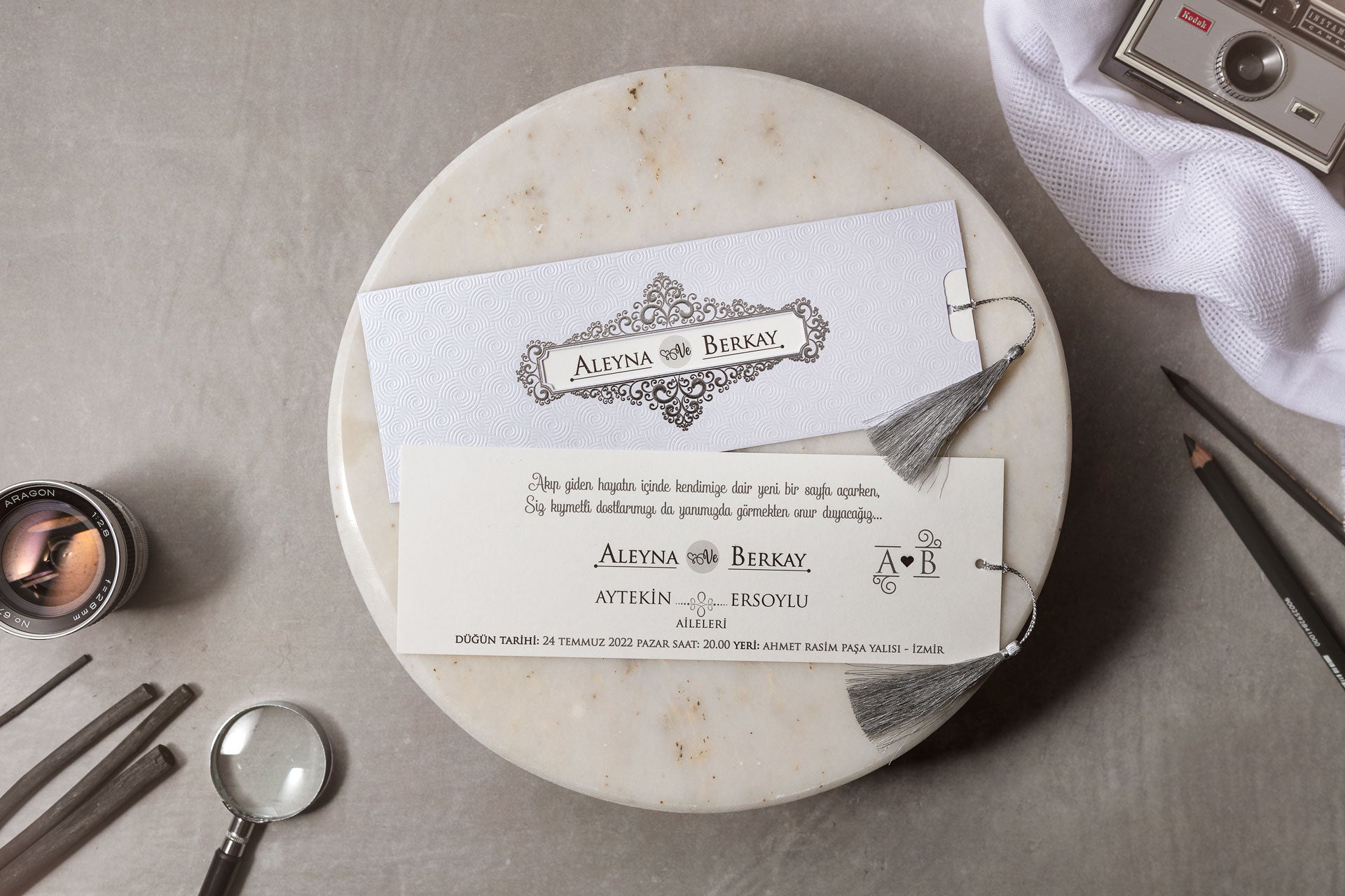 Elegant White Scroll Pattern Wedding Invitation with Silver Tassel