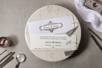 Elegant White Scroll Pattern Wedding Invitation with Silver Tassel