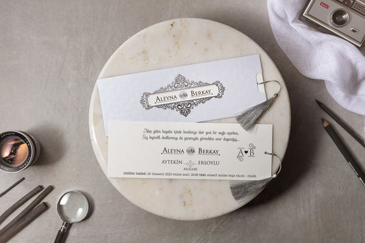 Elegant White Scroll Pattern Wedding Invitation with Silver Tassel
