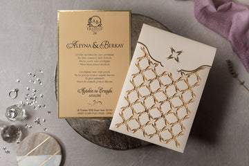 Cream & Gold Laser-Cut Wedding Invitation with Ornamental Sleeve