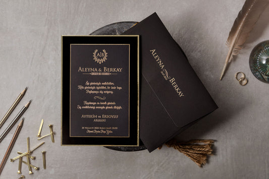 Elegant Black & Gold Wedding Invitation with Embossed Details
