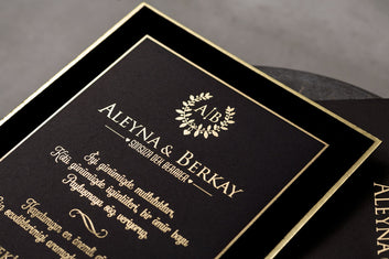 Elegant Black & Gold Wedding Invitation with Embossed Details