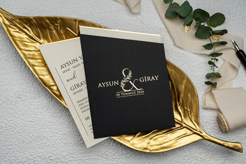 Elegant Black & Cream Wedding Invitation with Gold Monogram